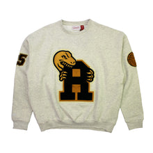 Load image into Gallery viewer, Buy Toronto Raptors Varsity Unisex Oversized Crewneck by Mitchell & Ness - Oatmeal