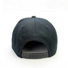 Load image into Gallery viewer, Buy Men's Toronto Raptors Eye of the Tiger snapback hat by Mitchell & Ness - Black