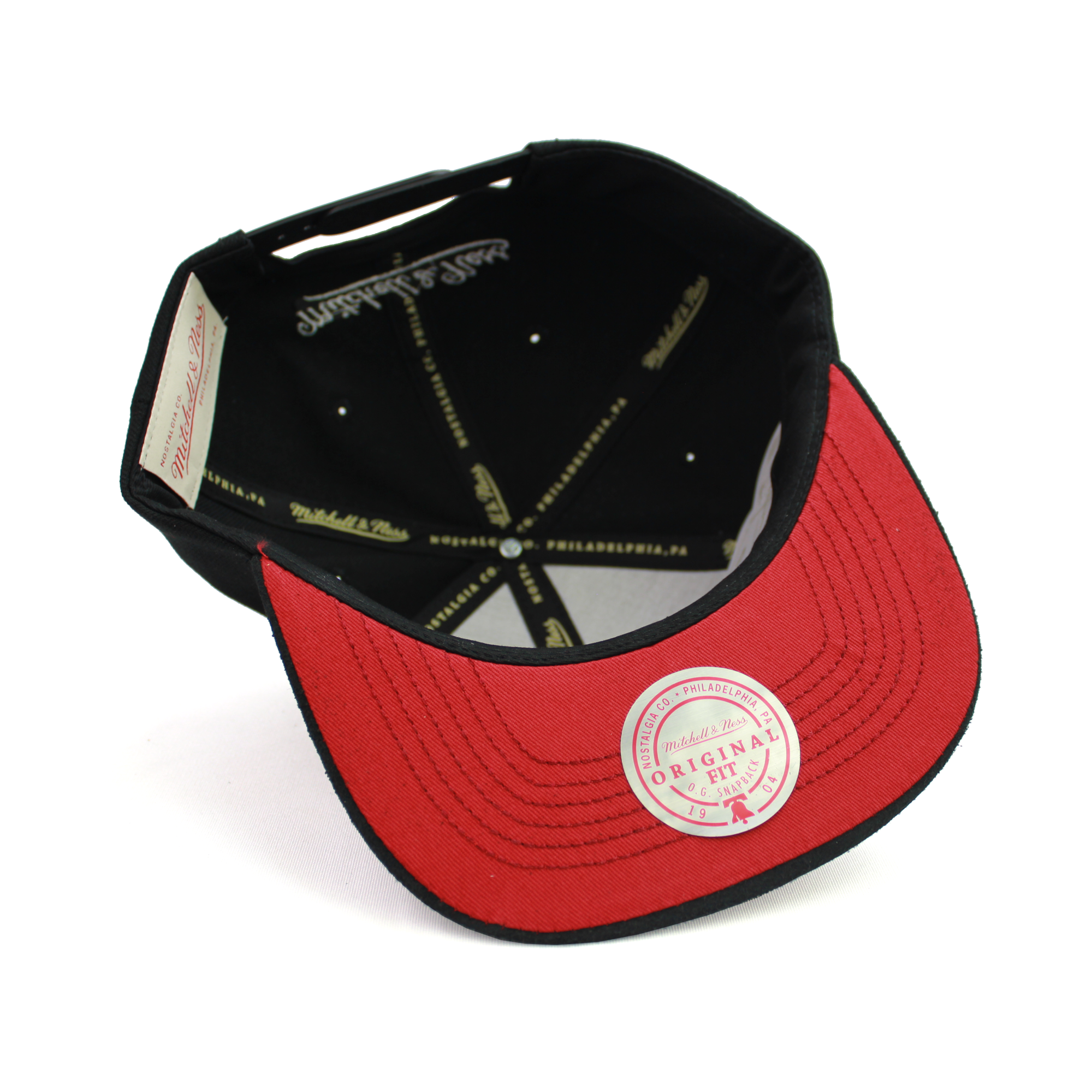 Men's Toronto Raptors Munch Time Snapback Hat by Mitchell & Ness